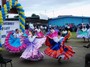 The school held many fund-raising events to get enough money to buy the fabric from which the dancers' costumes were made.